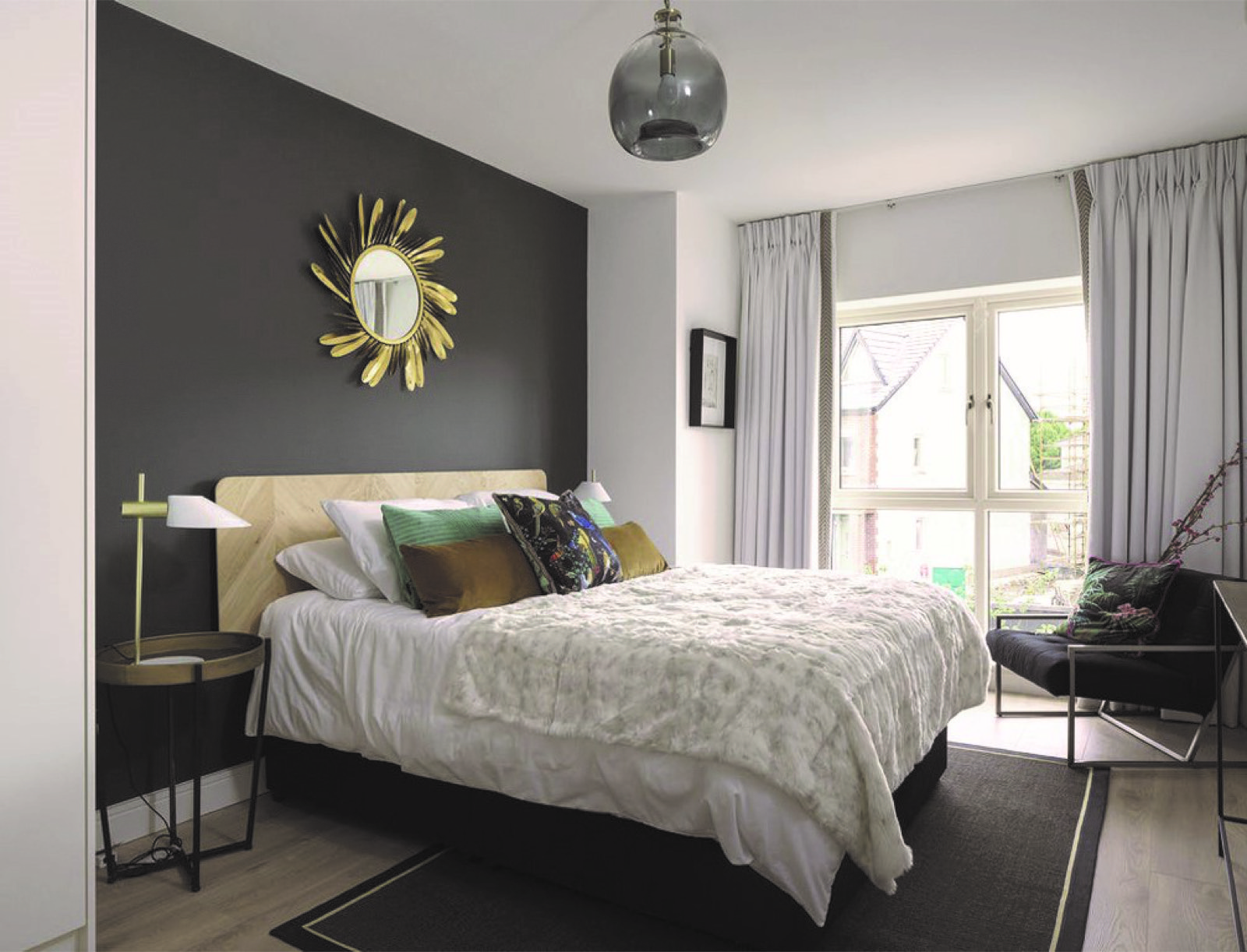 Master bedroom with charcoal feature wall at Elsmore, Naas